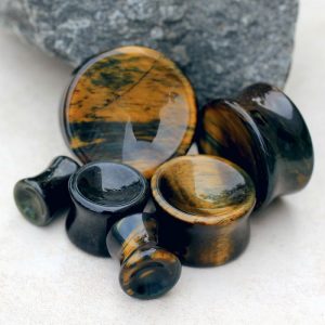 Brown and dark wood style plugs of various sizes