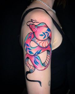 Pink and blue snake neotraditional arm tattoo